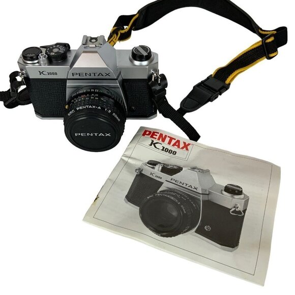 Pentax Asahi K1000 35mm SLR Film Camera 50mm Lens Strap User Manual Vtg 1980s - Picture 1 of 9